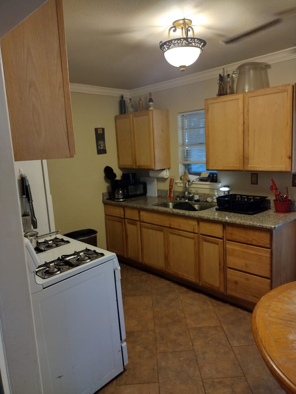 Granite countertops, dishes, cups & utensils provided.