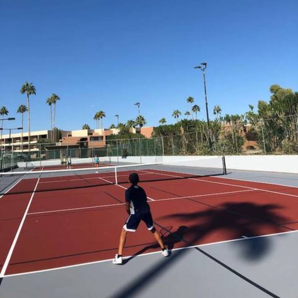 Your Tennis Haven: Less than a stone's throw away from our villa (about 50 yards) to the onsite Tennis Academy with 4 tennis courts and a Tennis Pro Shop at the world-famous Seth Korey Tennis Academy, Scottsdale.
