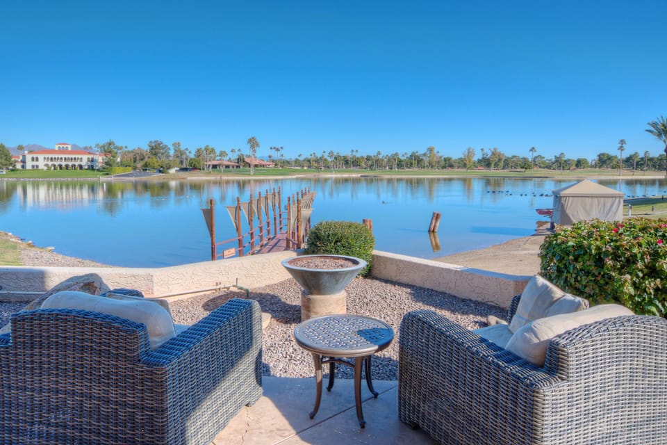 Lakefront & Golf View Dining: Experience a stunning Resort with fire pits, offering picturesque lakefront and golf course views. Enjoy privacy in a Private Villa with access to Resort Amenities, including the Resort Pool nearby.

