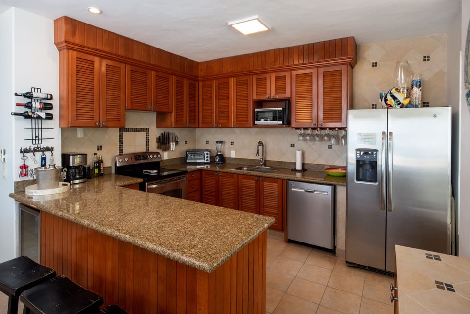 Fully equipped gourmet kitchen.