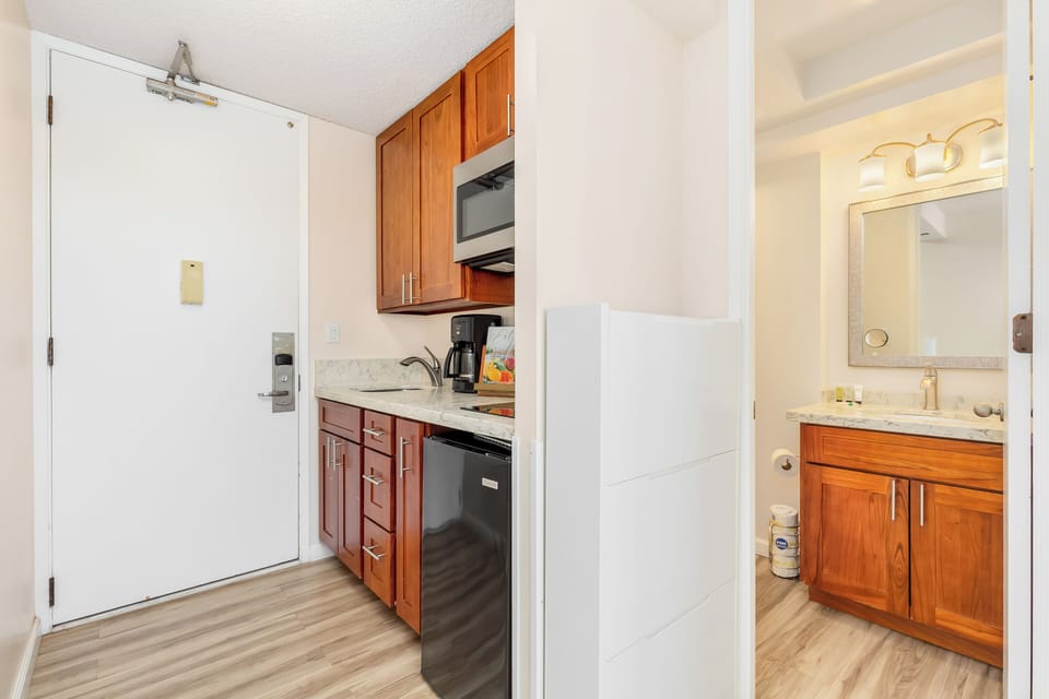Entrance to the condo and door to the bathroom