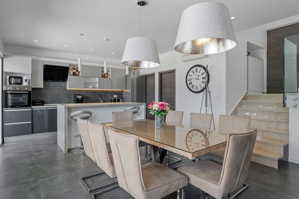 The dining are is on the ground floor with a table for 8 people