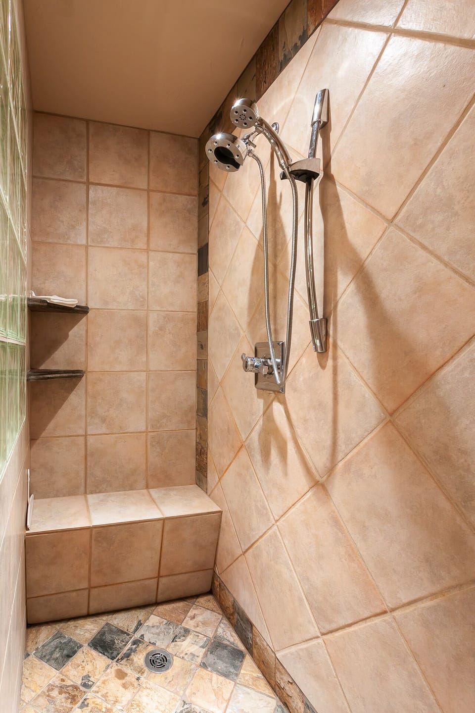 Walk In Shower with dual function fixture in Primary Suite Bathroom