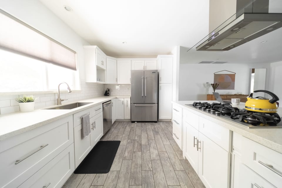 Recently remodeled kitchen with Viking stainless steel appliances and gas stove