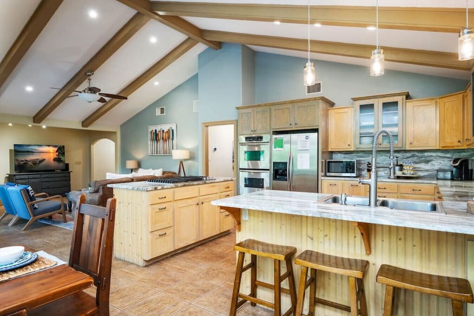 Cook, dine, and unwind with stunning Comal River views just beyond the kitchen