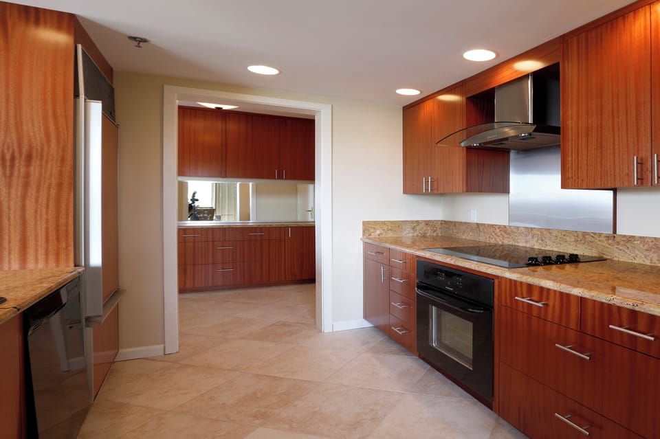 Kitchen with tile floors, granite counter tops, convection oven, stove to, mcrwv