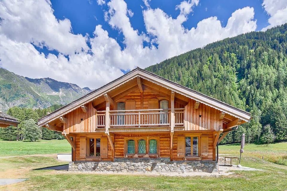 Garden view of the back of the Chalet, Grand Montet in background 
