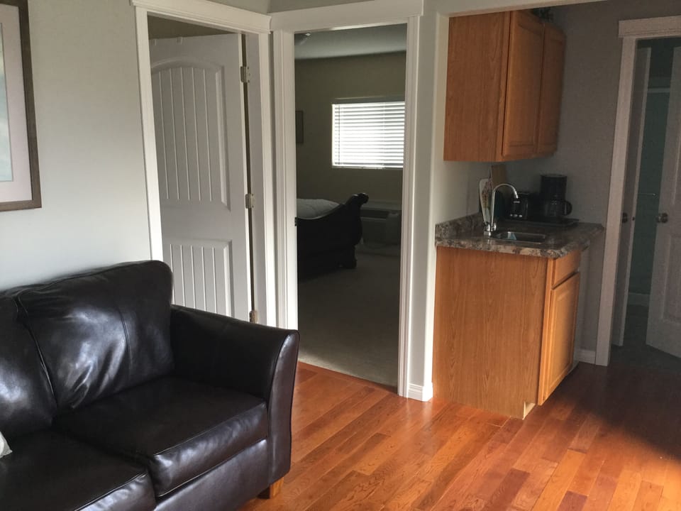 2 bedrooms off living room and small kitchenette.
