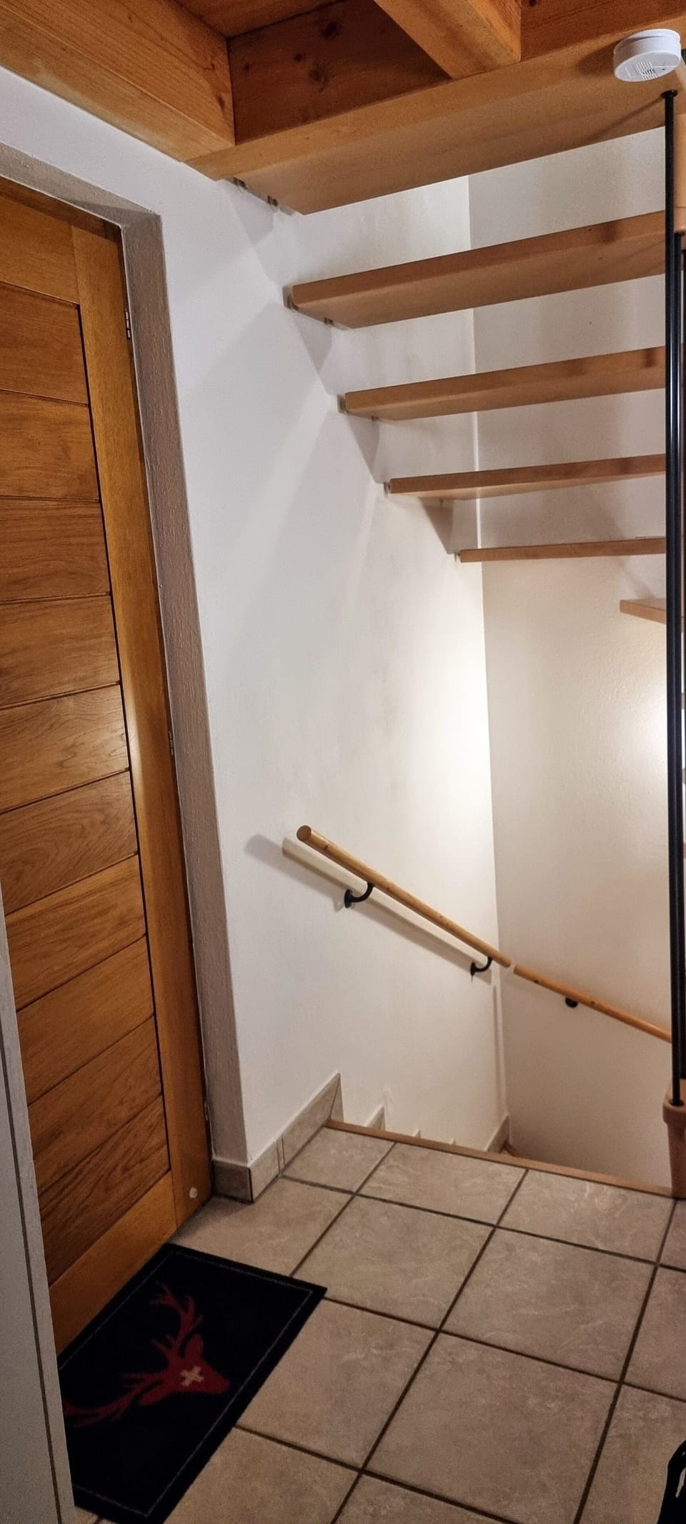Stairs to the bedrooms and toilet/shower
