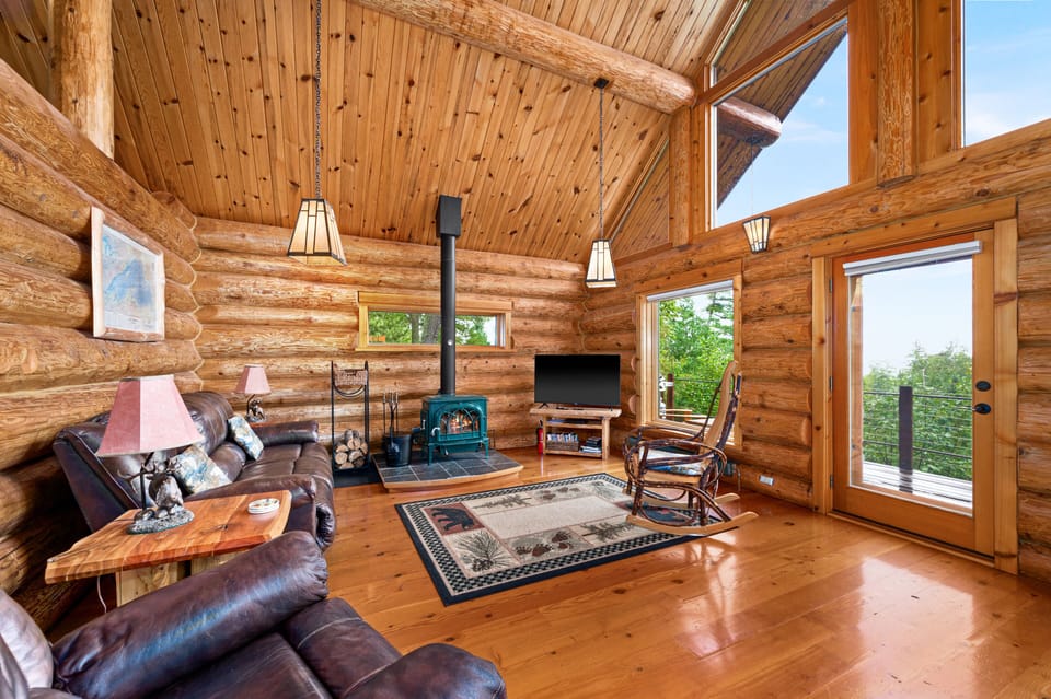 The lake side of the cabin with wood burning stove.  Wood is provided for this.