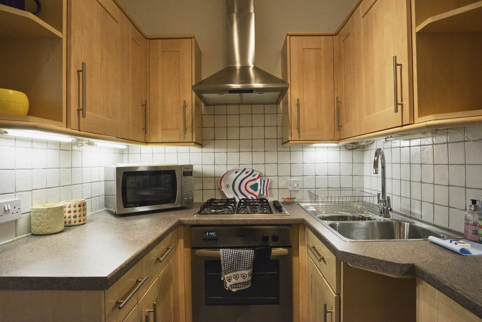 Kitchen with oven and microwave 