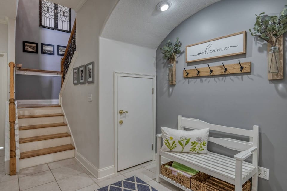 The lovely staircase leads to the main living space with kitchen and Master bedroom suite.