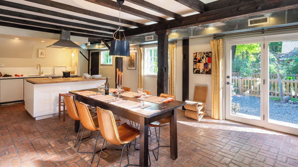Dine with views and access to the garden and outdoor dining on the patio