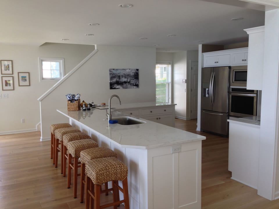 Kitchen / Bar with staircase upstairs