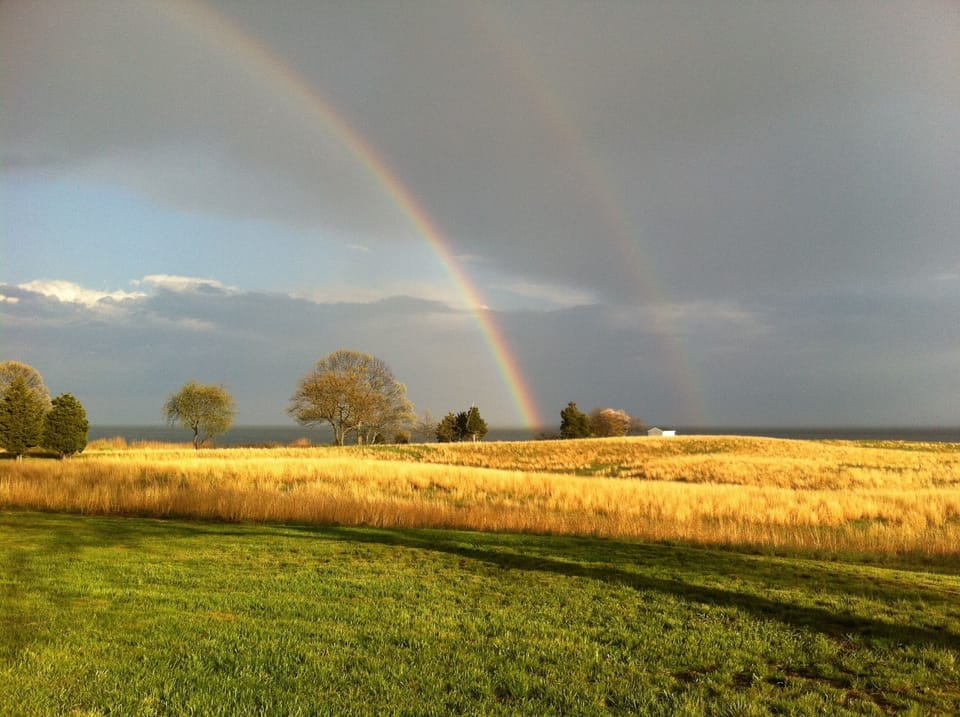 Views toward LI Sound with beautiful double rainbow.
