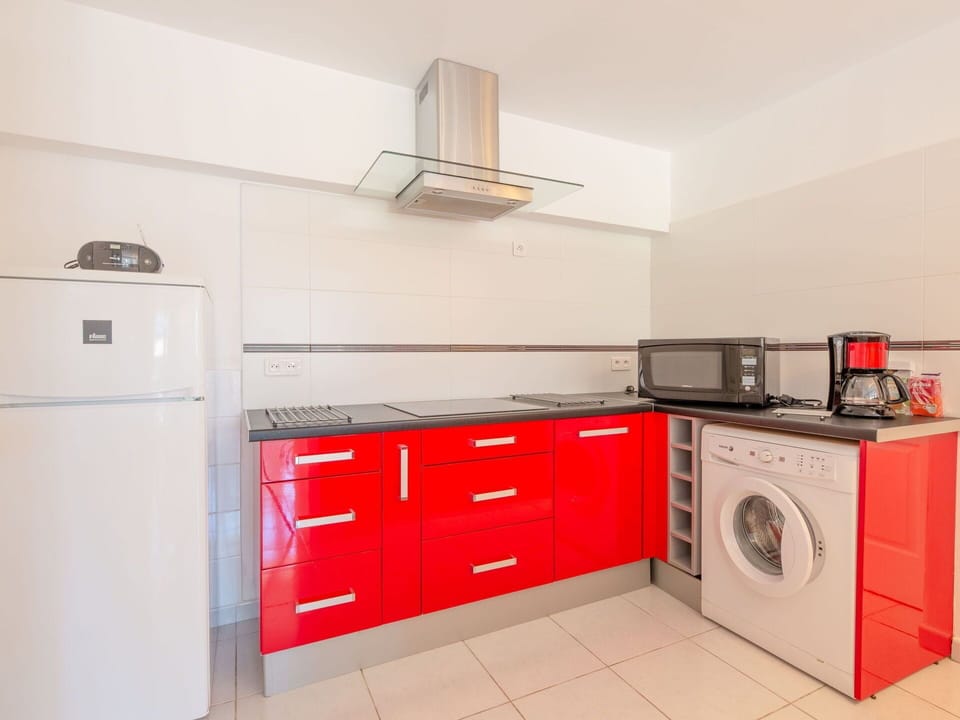 Cabinetry, Countertop, Kitchen Stove, Kitchen Appliance, Home Appliance, Kitchen, Wood, Interior Design, Drawer, Floor