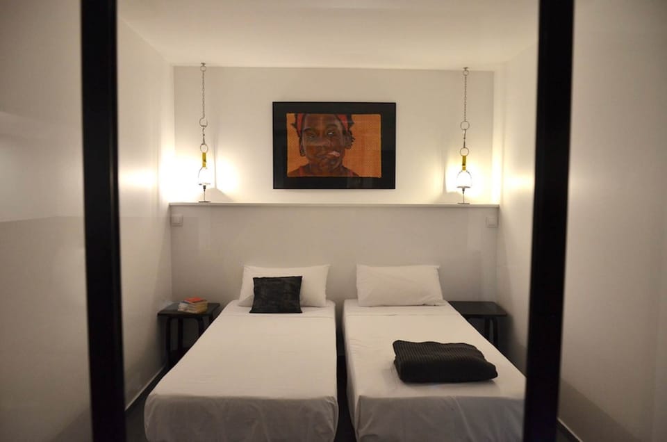 Chambre avec deux lits simples