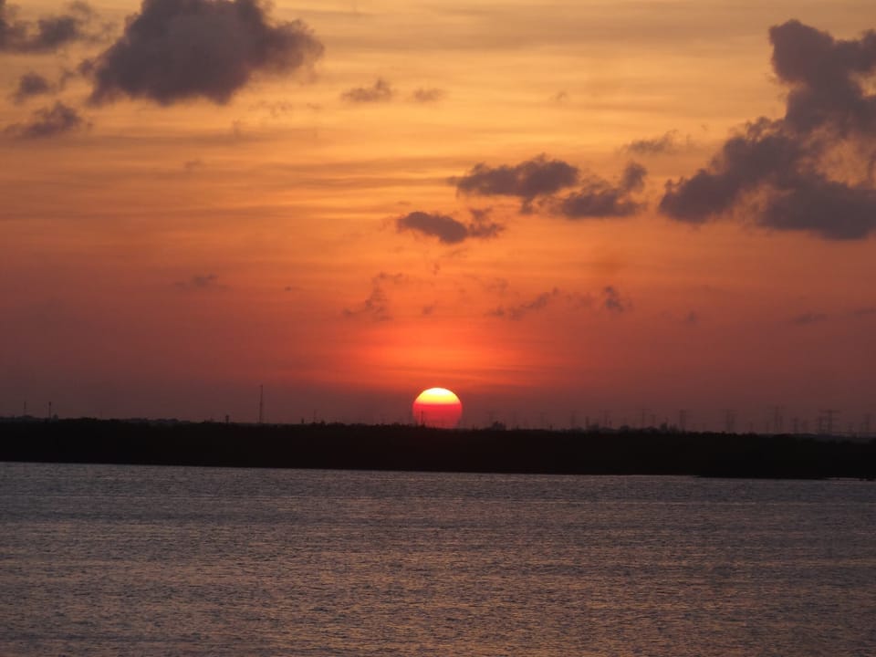 Sunset over the lagoon just across the street.  Most restaurants have this view.