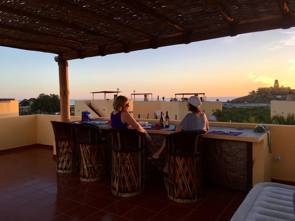 Whale watching and cocktail at sunset.