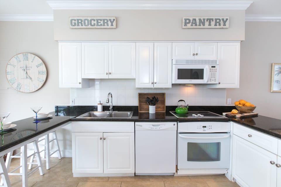 The kitchen is open to the dining room
