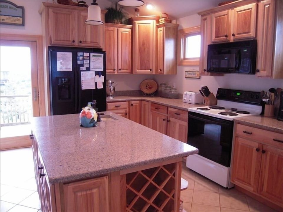 large spacious kitchen, with plenty of room for many cooks or helpers.