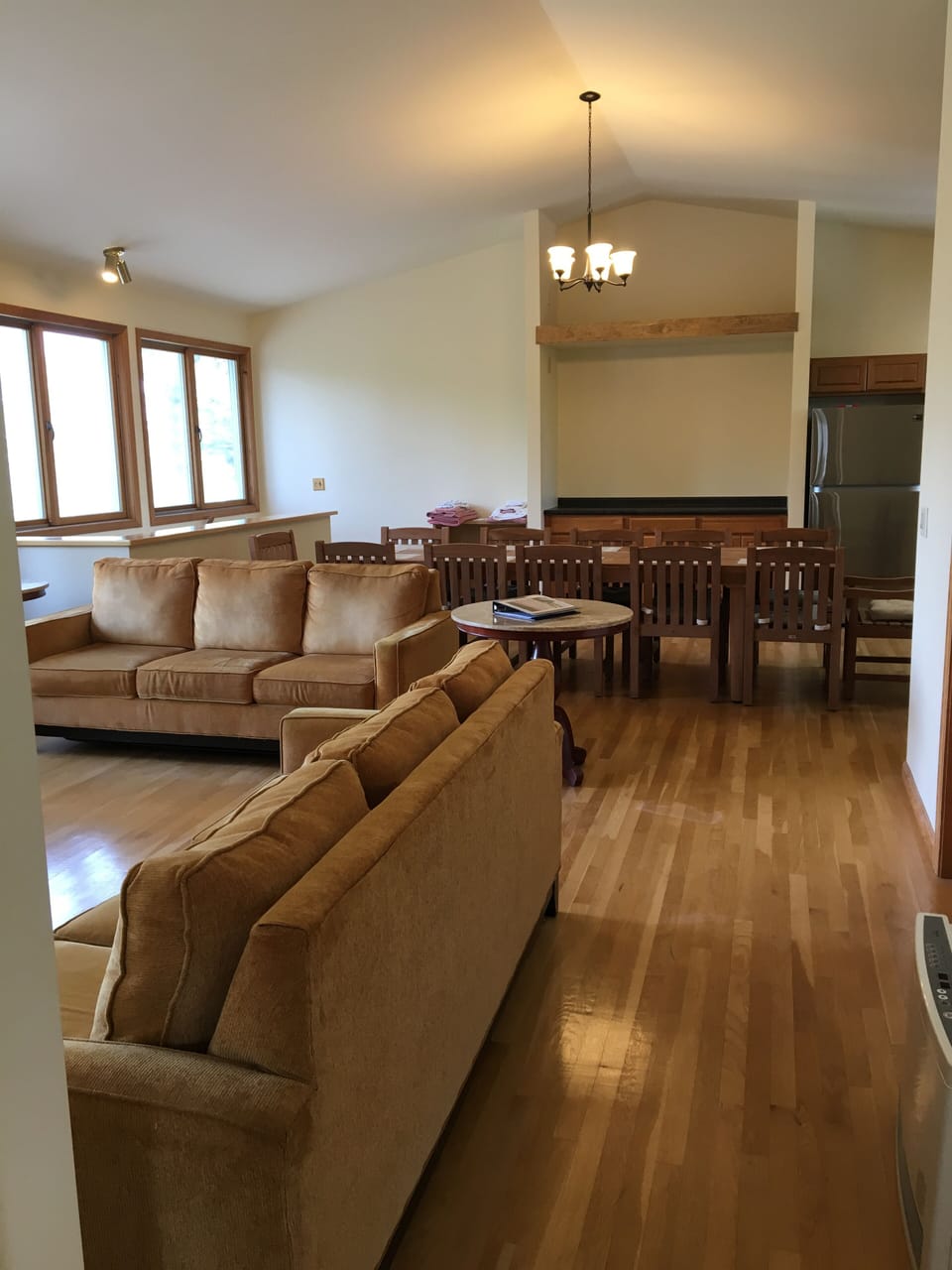 Open format with cathedral ceiling combines living/dining area into grand space!