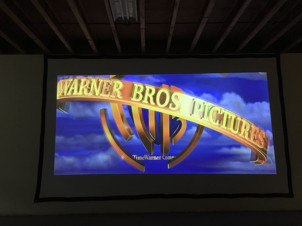 Rec room home theatre, Laser projector for Netflix. Screen is over 12' wide!