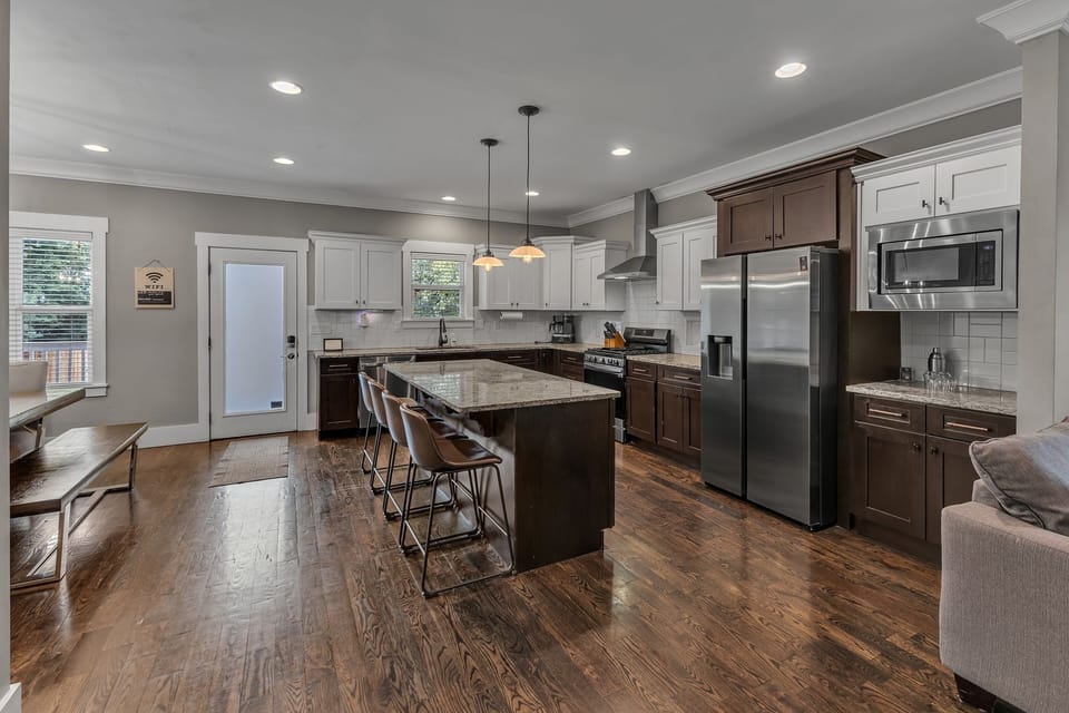 Open Kitchen Design with Bar Seating for 4