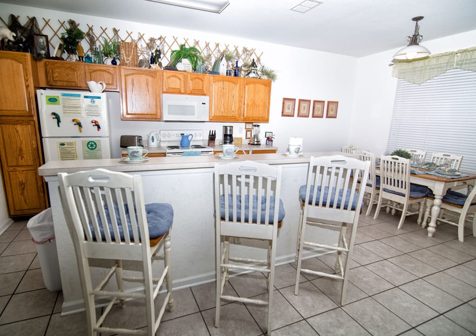 Full size refrigerator, stove, microwave and dishwasher.  