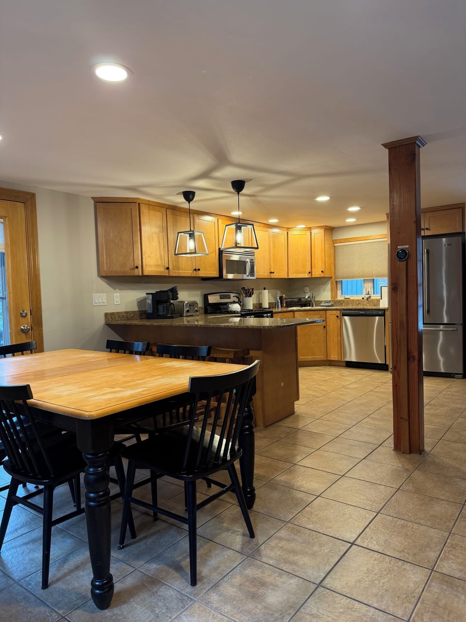 Kitchen with deck and grill off to side