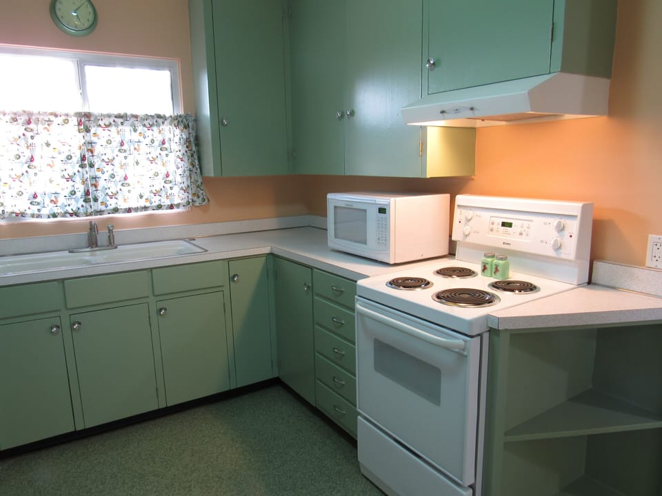 Retro kitchen with original linoleum floors.