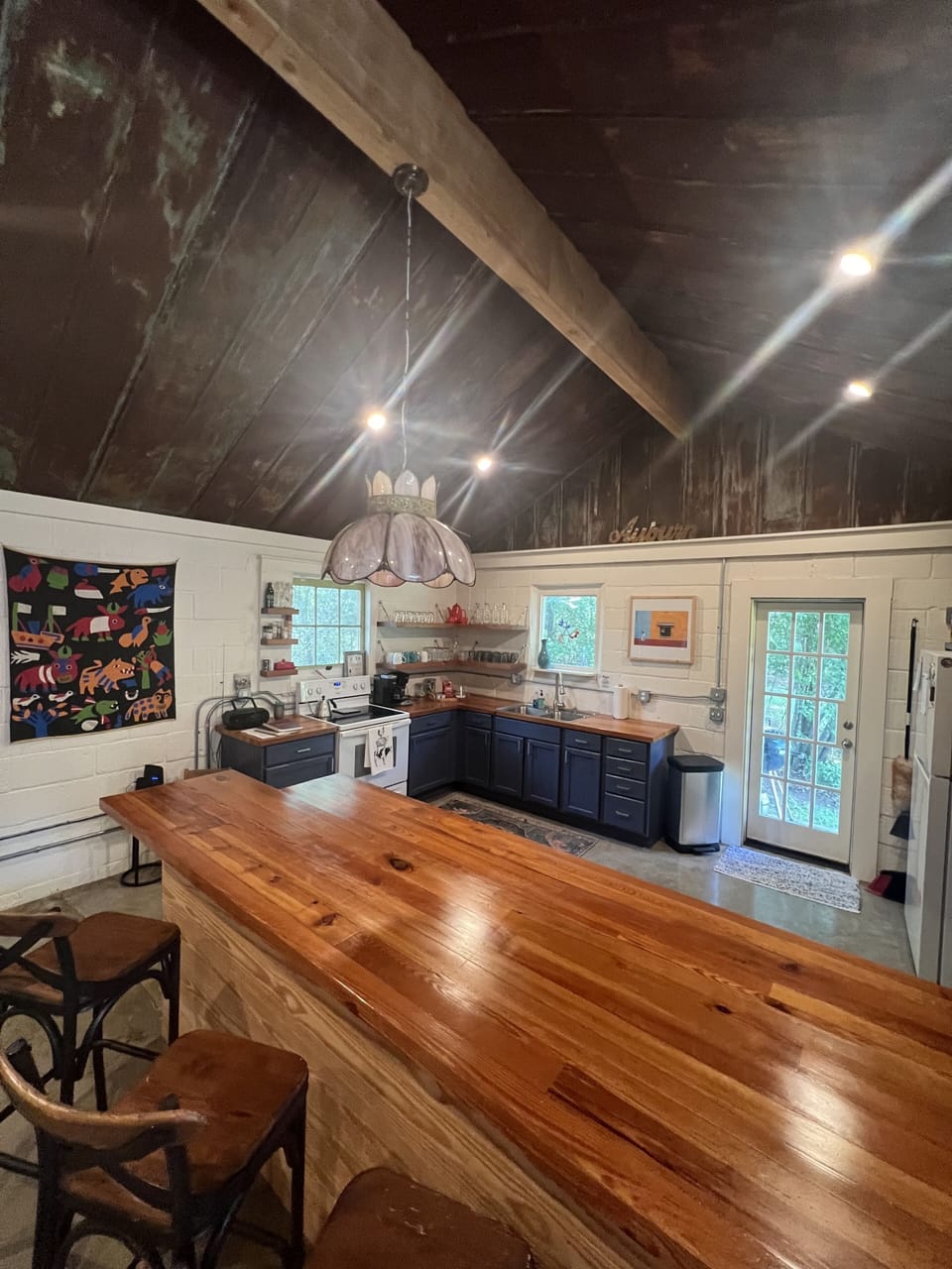 Brand new kitchen with 100yr old heart pine countertops, crafted locally. Clean!