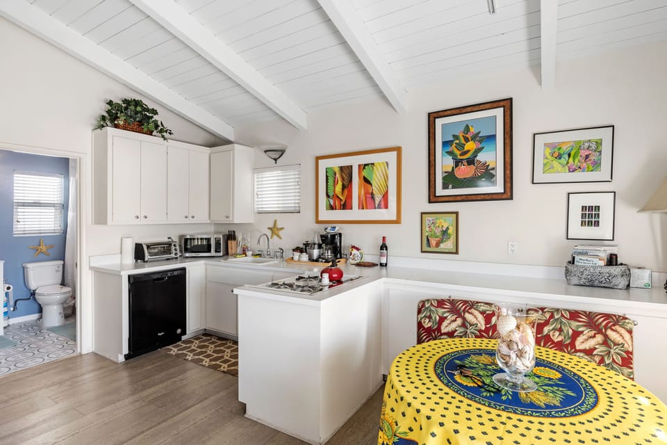 Kitchen, dining area.  Bathroom to the left.