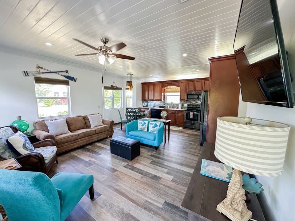 Open living room and kitchen 
with a Queen pullout bed