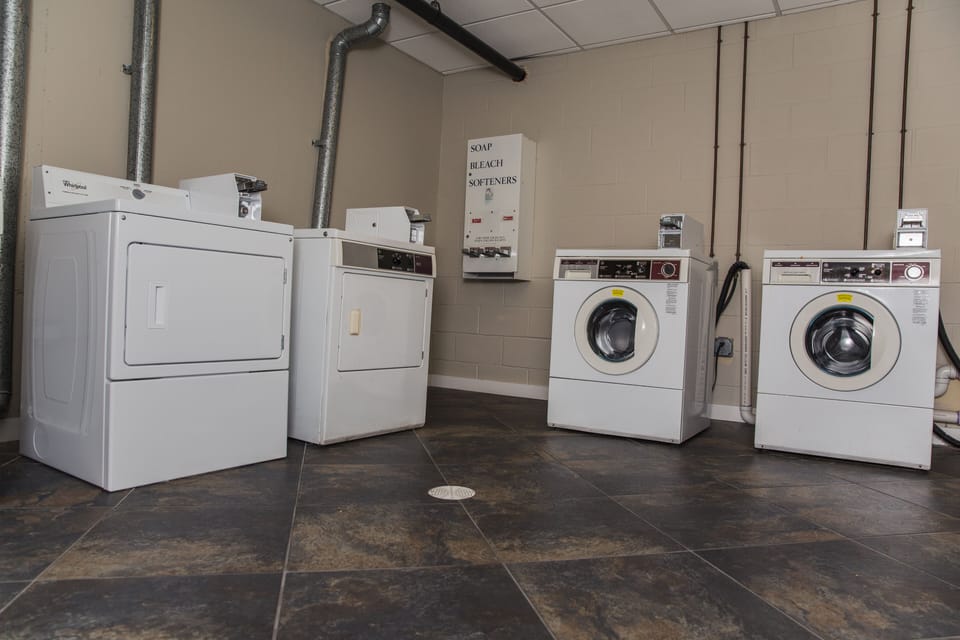 Public laundry located on the ground floor is available for use