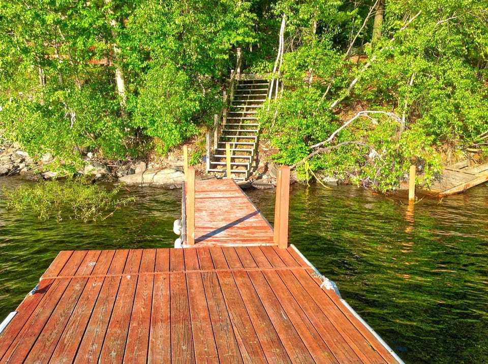 View of dock and steps leading to lake level.