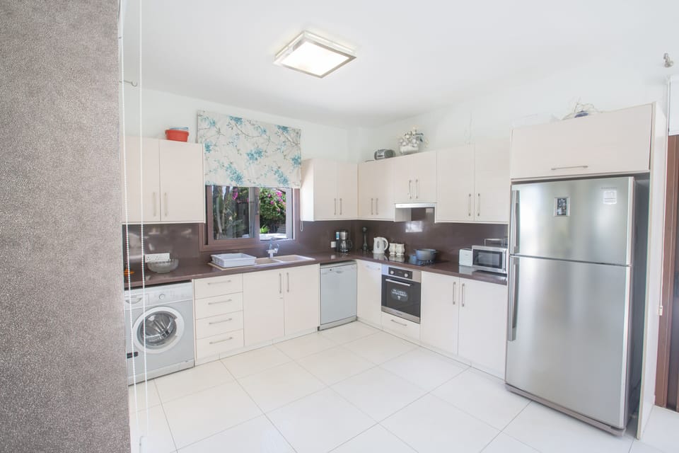 Modern Kitchen fully equipped with all dishes and utensils
