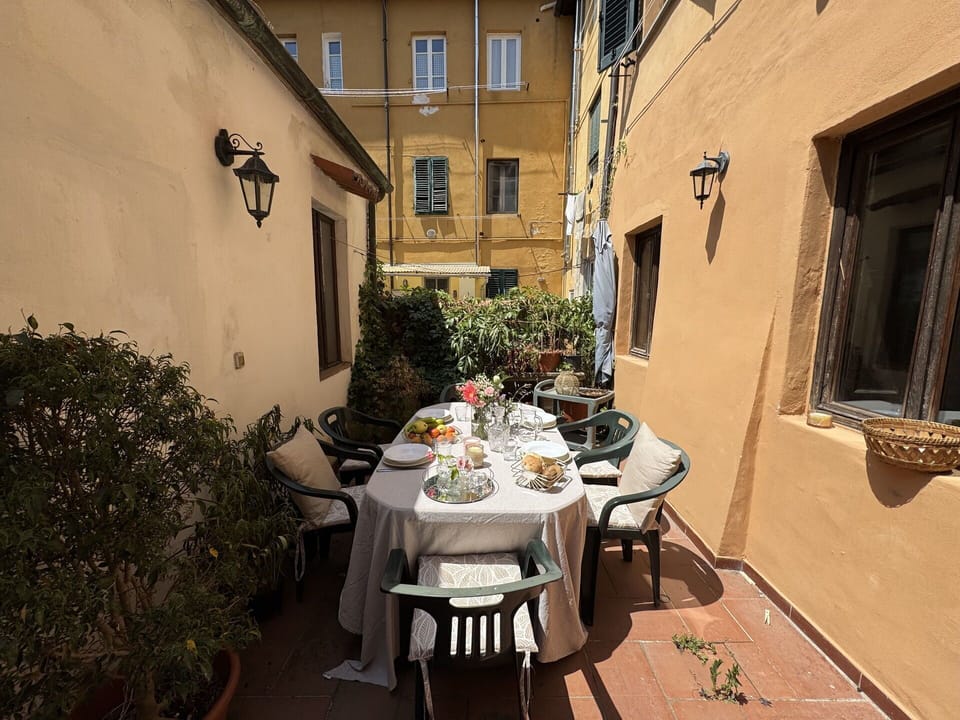 Furniture, Chair, Table, Flowerpot, Door, Houseplant, Outdoor Table, Kitchen & Dining Room Table, Outdoor Furniture, Balcony