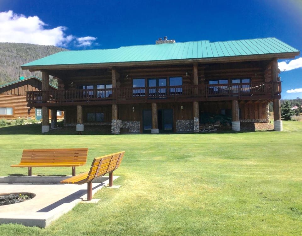 Back of cabin, with fire pit.  Plenty of room to play!