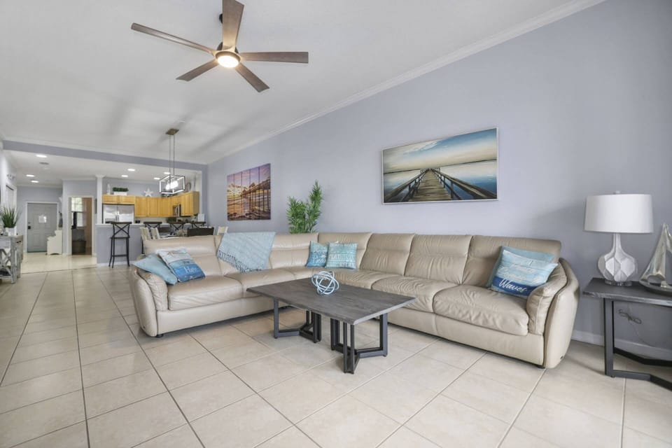 Updated Living Room with Leather Sectional Sofa