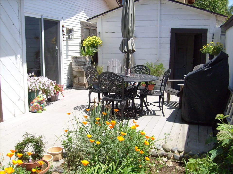 Sunny deck for outside dining off of the kitchen.