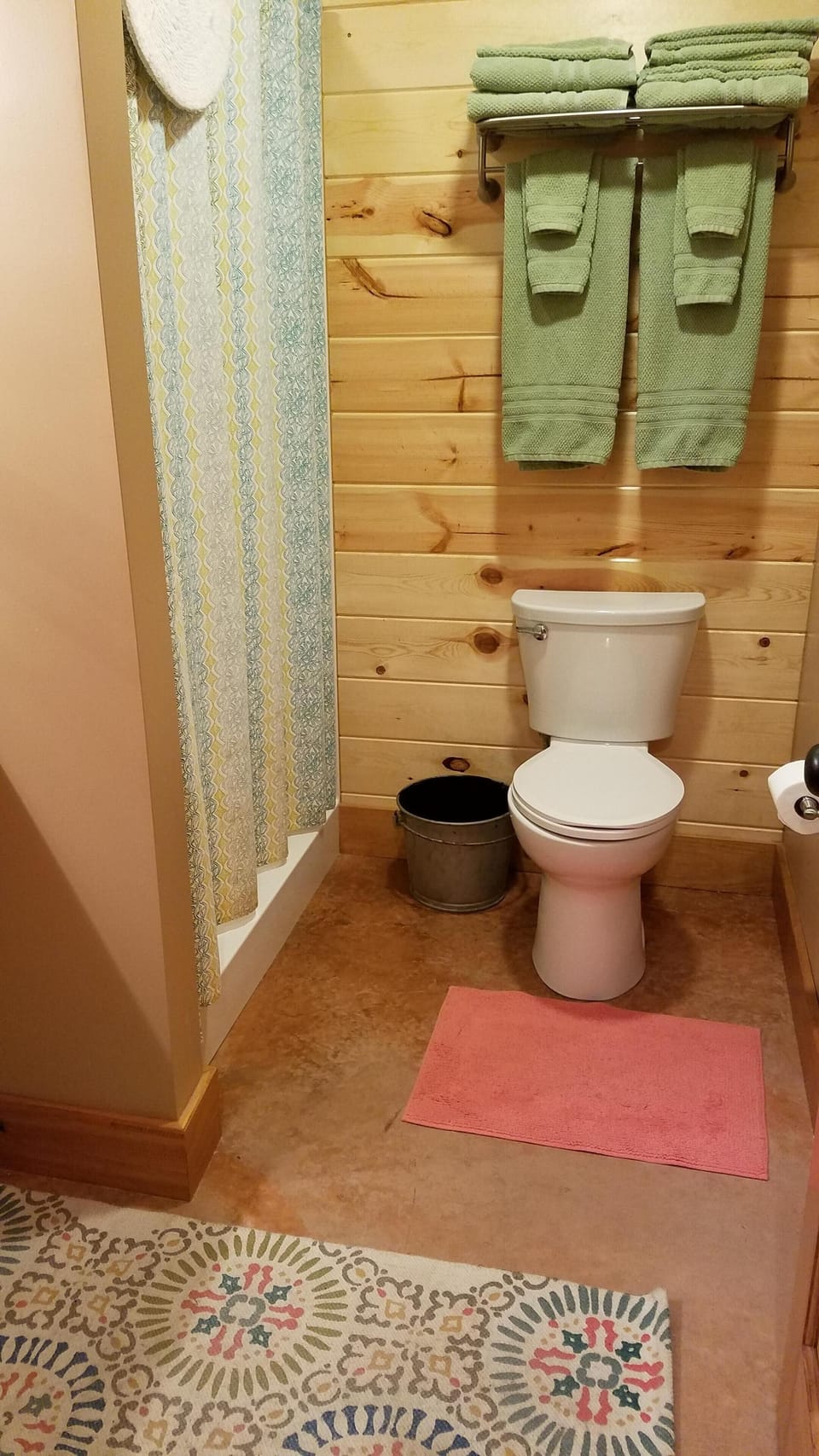 Downstairs bathroom has a large, stand-up shower.
