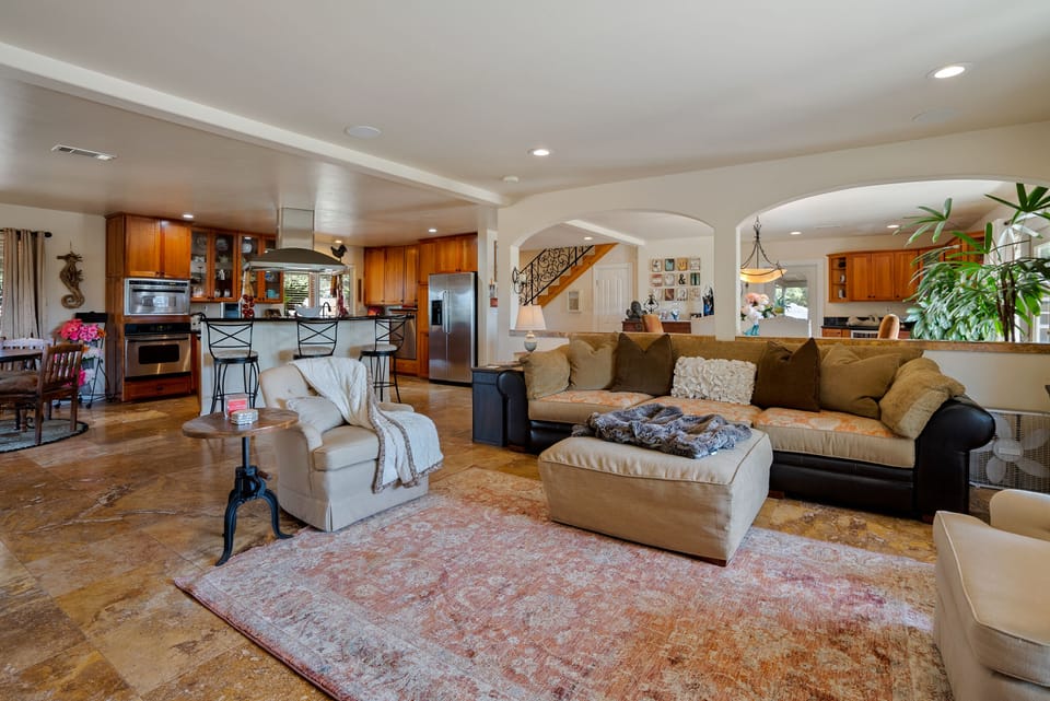 Large living room opens to kitchen, dining room and breakfast nook
