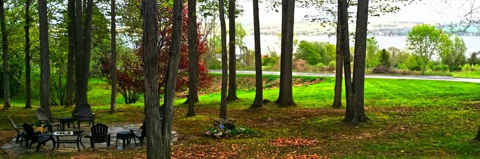 Enjoy the evening relaxing here on this slate patio with firepit and great views