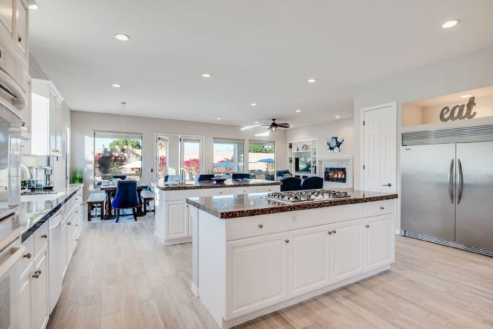 Dual Islands with cooktop and vegetable sink