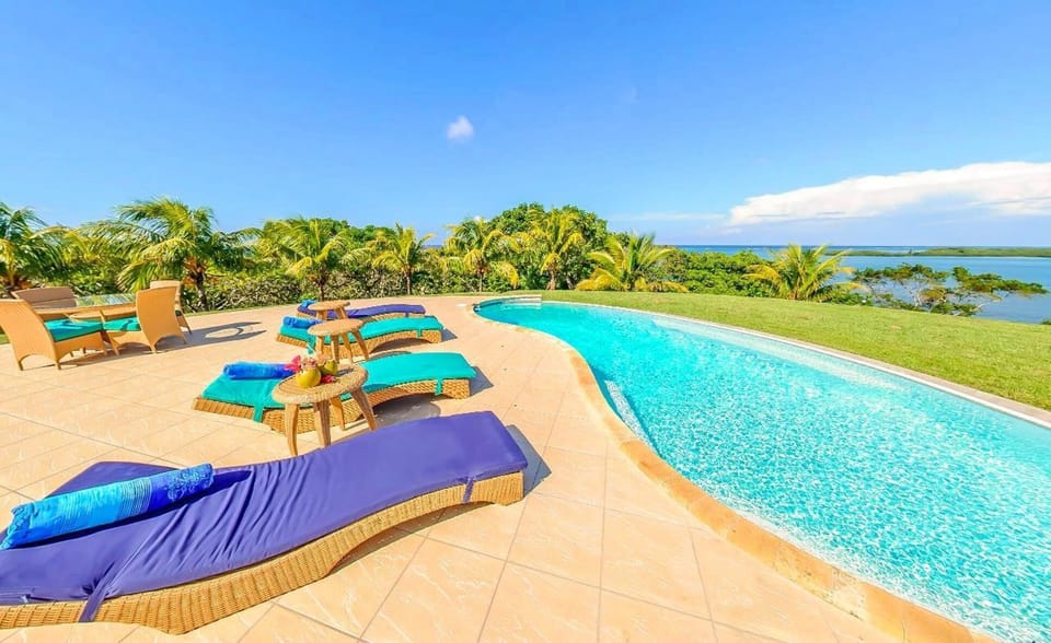 Enjoy a cocktail by the pool...