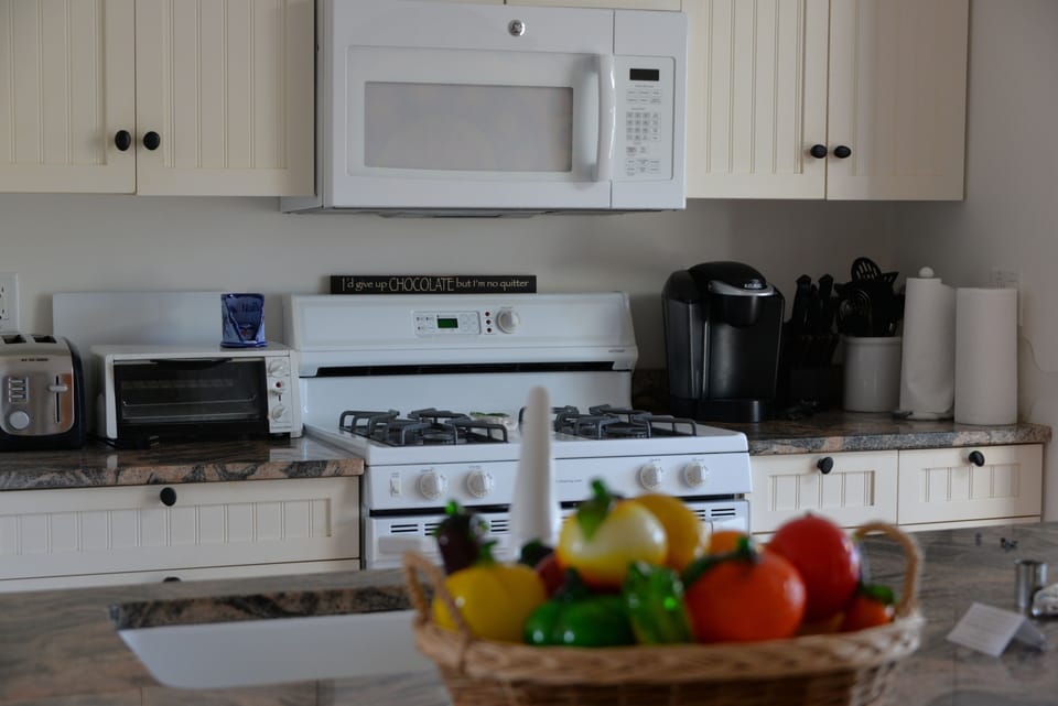 Fully appliance kitchen with microwave and dishwasher