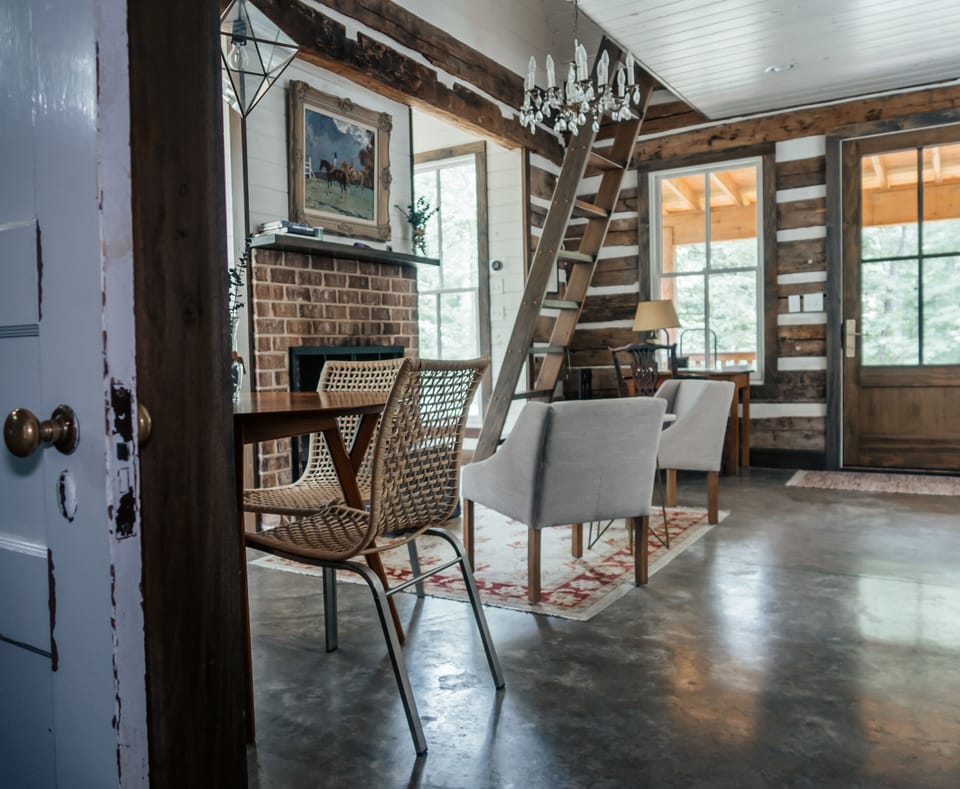 additional photo of living area and dining space in the kitchen