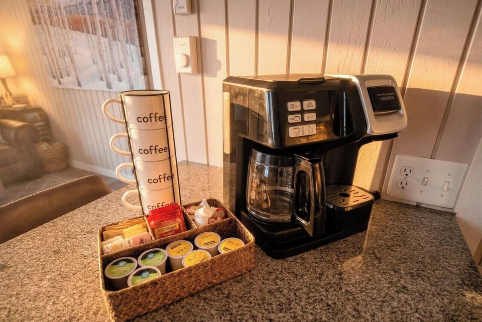 Coffee bar ready — drip + K-cup with complimentary coffee & tea