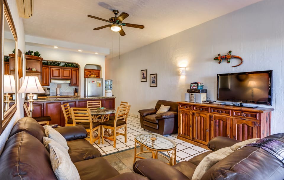 Cozy  living room where you can talk to those in the kitchen.